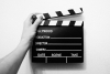 Filmklappe mit Hand